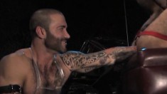 Lustful guy has a tattooed stud fisting his ass the way he deserves it